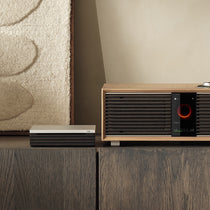 Ruark R-CD100 CD Player in Ebonised veneer finish, shown with R410 Anniversary Edition